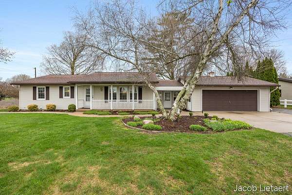 14 Acres of Land with Home for Sale in Rockford, Michigan