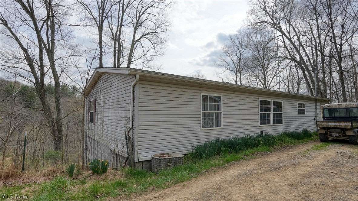 62.6 Acres of Recreational Land with Home for Sale in Warsaw, Ohio