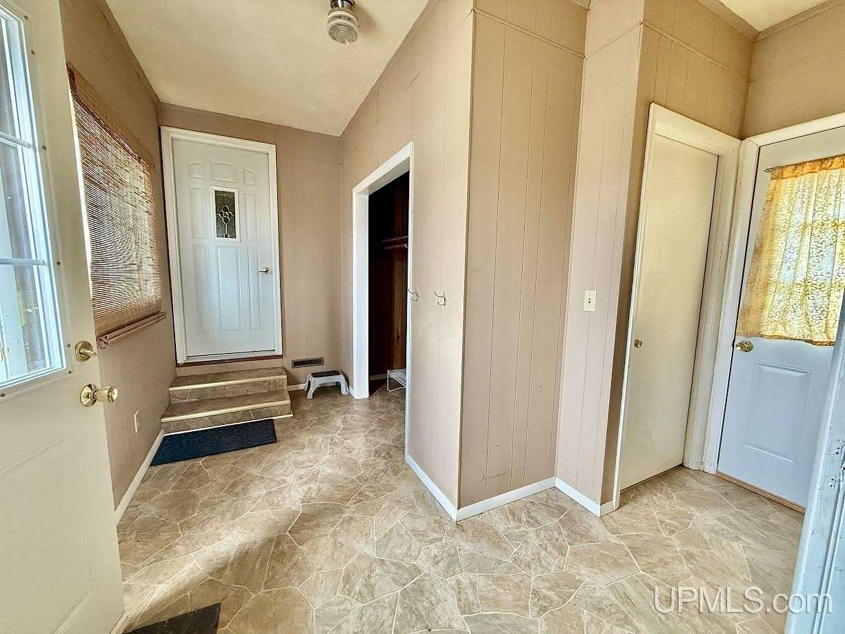 2 Acres of Land with Home for Sale in Bark River, Michigan