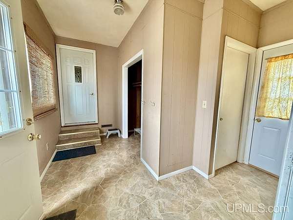 2 Acres of Land with Home for Sale in Bark River, Michigan