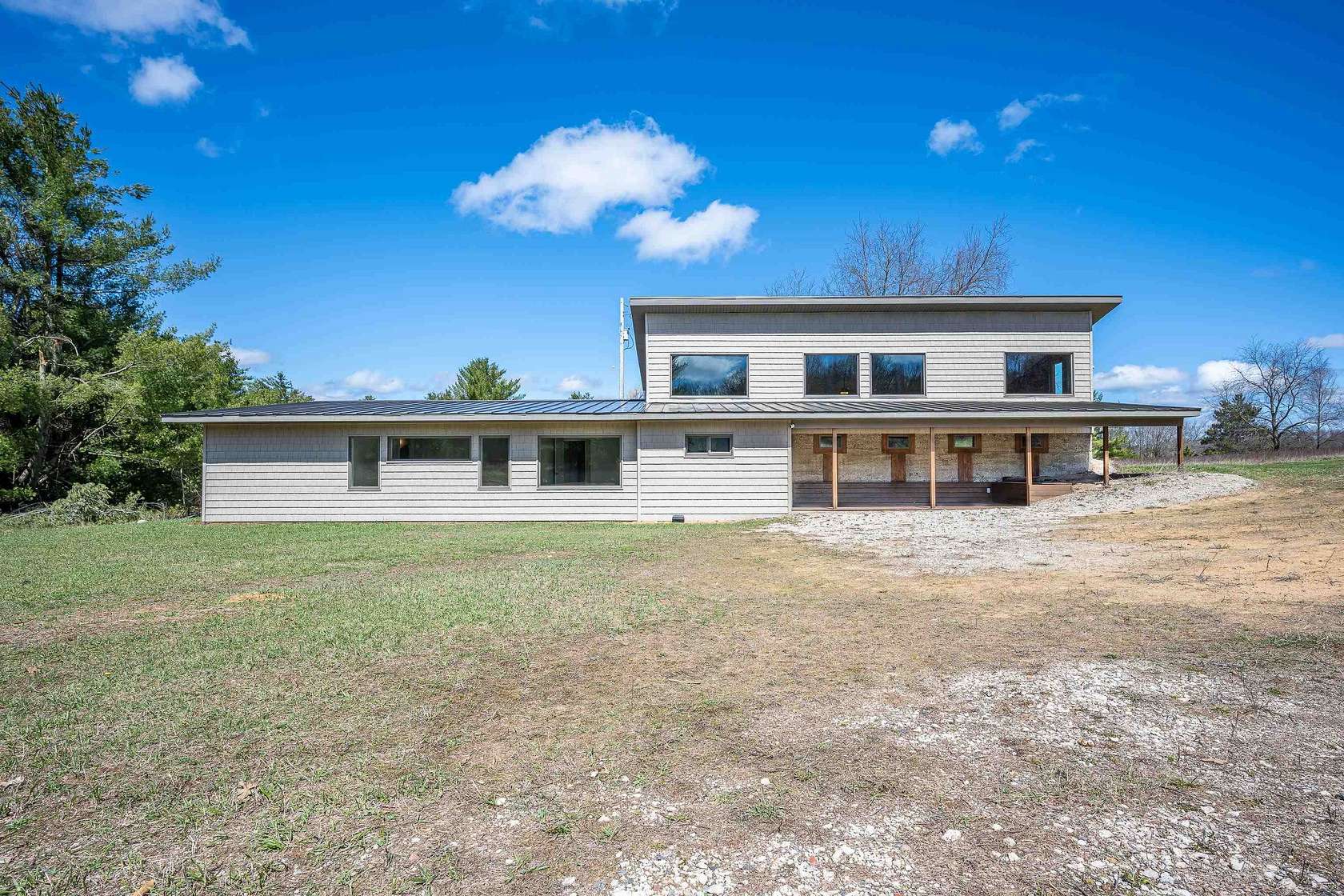 80 Acres of Recreational Land with Home for Sale in Harrison, Michigan