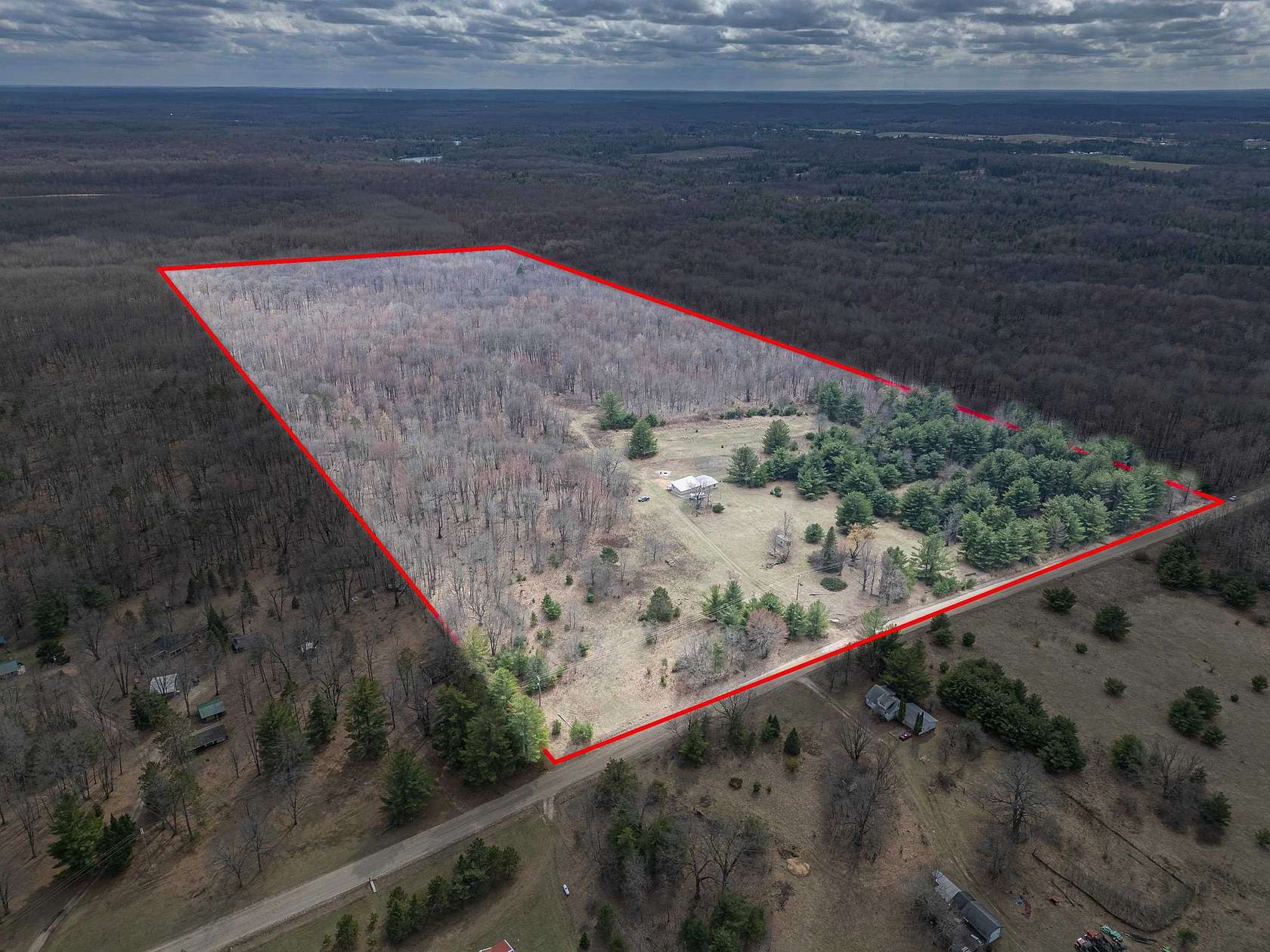 80 Acres of Recreational Land with Home for Sale in Harrison, Michigan