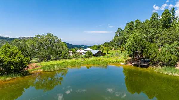 127 Acres of Recreational Land with Home for Sale in High Rolls, New Mexico