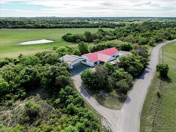 2.69 Acres of Land with Home for Sale in Springtown, Texas