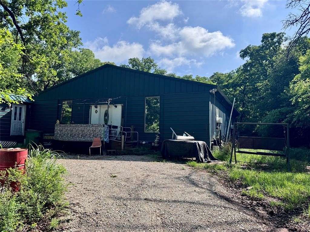 4.8 Acres of Land with Home for Sale in Nocona, Texas