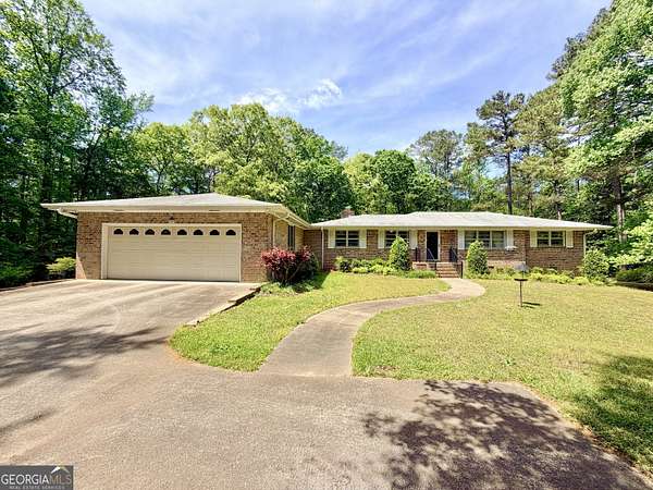 3.68 Acres of Land with Home for Sale in McDonough, Georgia