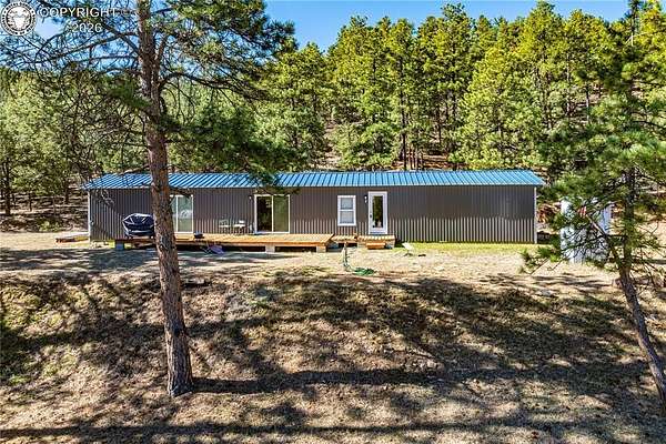 4.79 Acres of Land with Home for Sale in Cotopaxi, Colorado