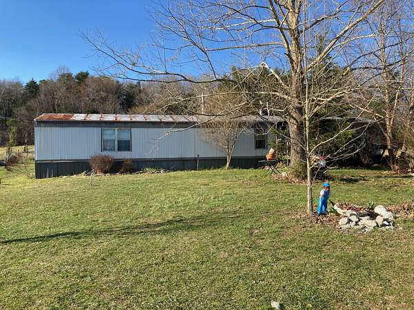 4.5 Acres of Land with Home for Sale in Hilham, Tennessee