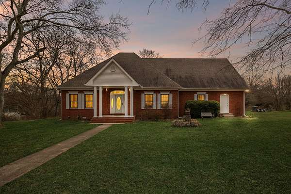 5 Acres of Land with Home for Sale in Castalian Springs, Tennessee