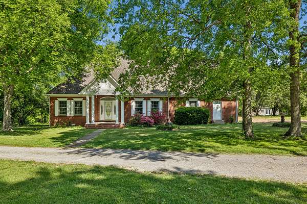 5 Acres of Land with Home for Sale in Castalian Springs, Tennessee