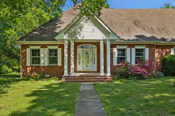 5 Acres of Land with Home for Sale in Castalian Springs, Tennessee