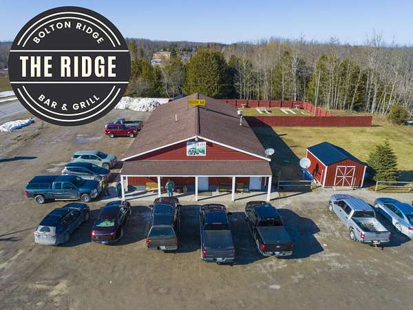 2.35 Acres of Improved Commercial Land for Sale in Posen, Michigan