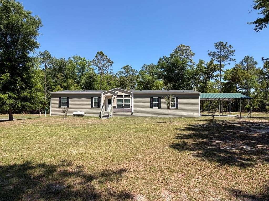 10.2 Acres of Land with Home for Sale in Branford, Florida