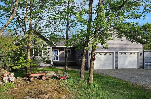 11.4 Acres of Land with Home for Sale in Milton, Vermont