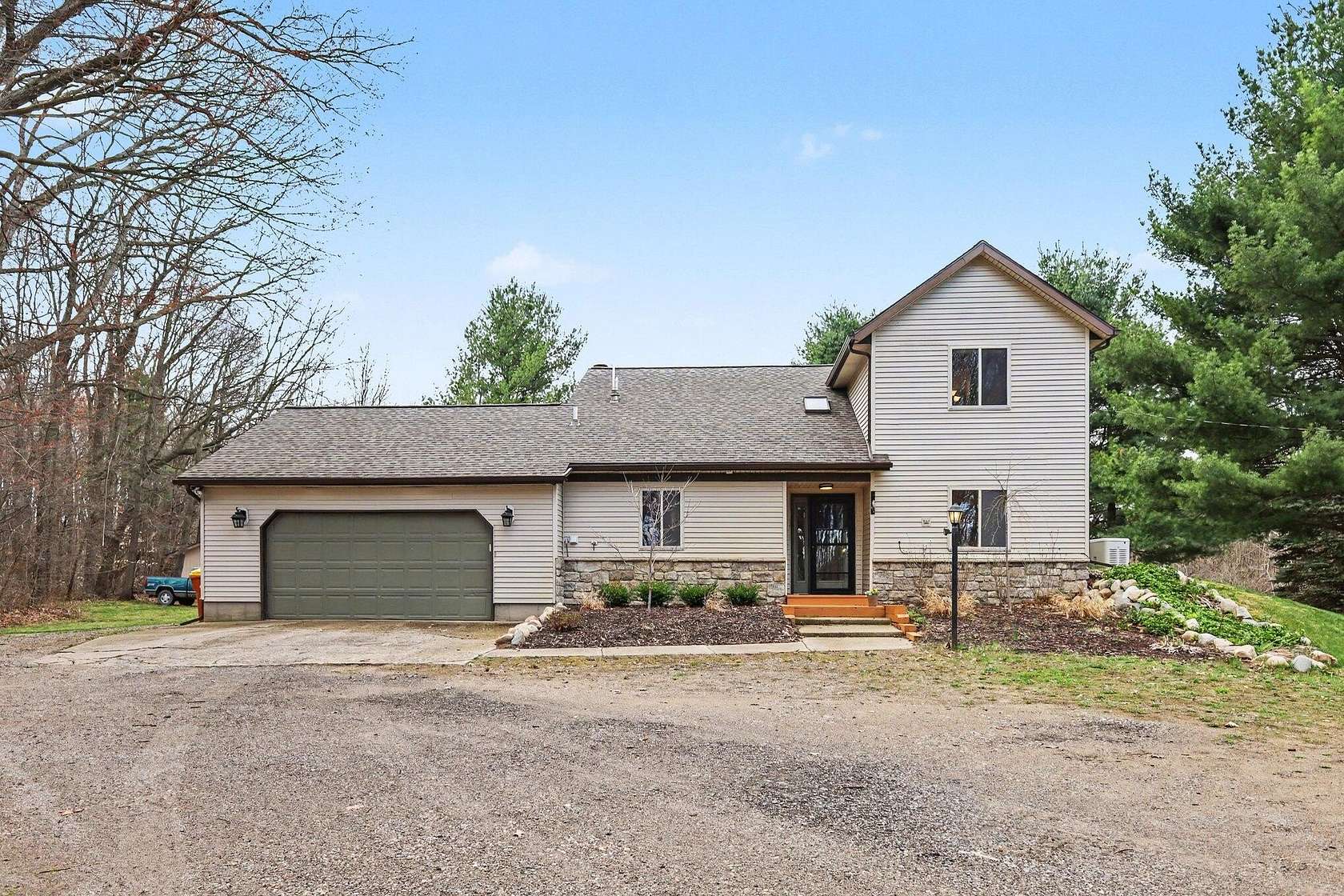 10 Acres of Recreational Land with Home for Sale in Greenville, Michigan