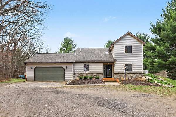 10 Acres of Recreational Land with Home for Sale in Greenville, Michigan