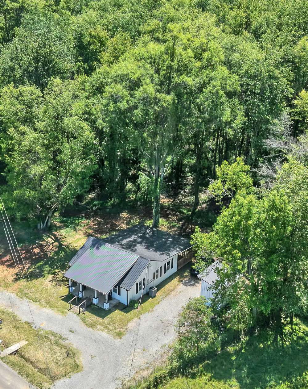 9.62 Acres of Land with Home for Sale in Smithville, Tennessee