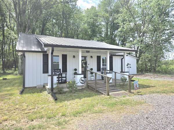 9.62 Acres of Land with Home for Sale in Smithville, Tennessee