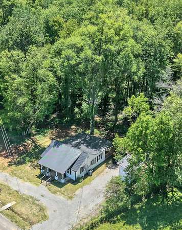 9.62 Acres of Land with Home for Sale in Smithville, Tennessee