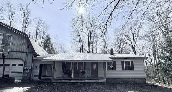 2 Acres of Land with Home for Sale in Lincoln, Maine