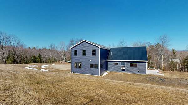 5.54 Acres of Land with Home for Sale in West Paris, Maine