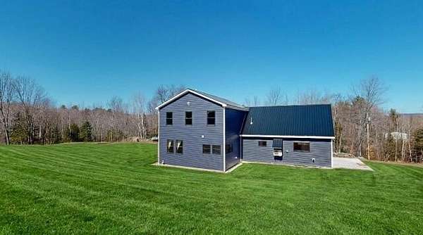 5.54 Acres of Land with Home for Sale in West Paris, Maine