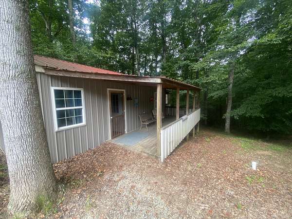 7.12 Acres of Land with Home for Sale in Columbia, Kentucky