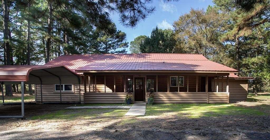 6.42 Acres of Land with Home for Sale in Quitman, Texas