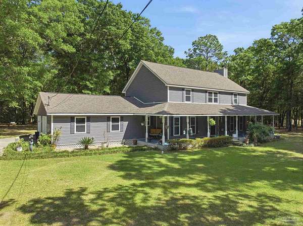 1.87 Acres of Land with Home for Sale in Milton, Florida