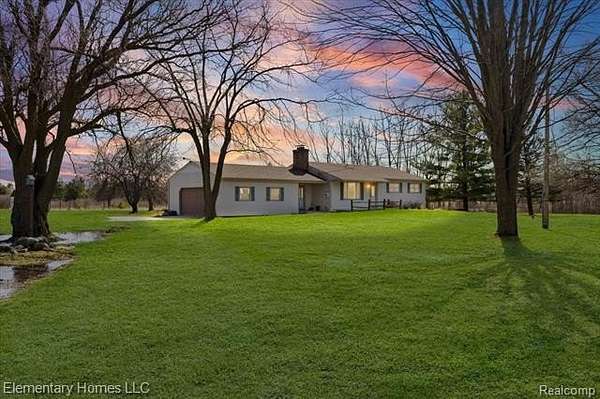 9.62 Acres of Land with Home for Sale in Wales Township, Michigan