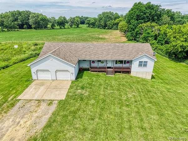 13.5 Acres of Recreational Land with Home for Sale in Handy Township, Michigan
