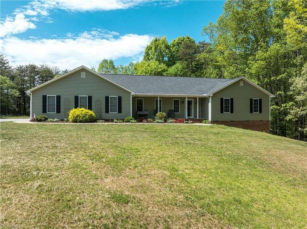 2.5 Acres of Land with Home for Sale in Stokesdale, North Carolina