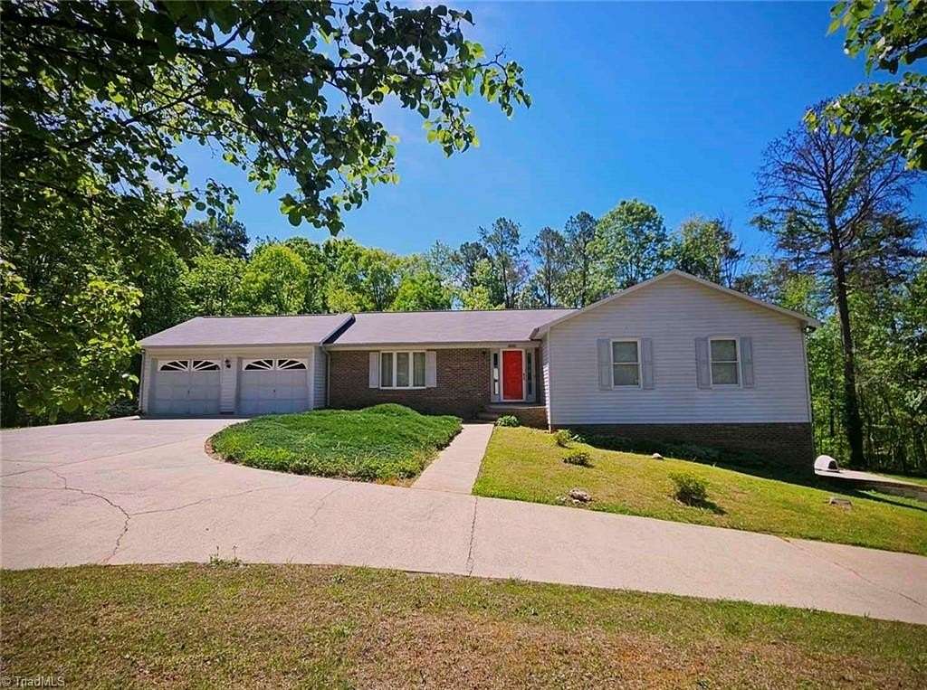 3.32 Acres of Land with Home for Sale in Rural Hall, North Carolina