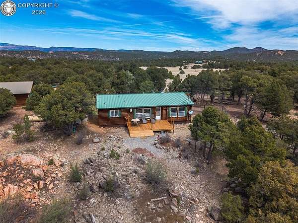 35.4 Acres of Recreational Land with Home for Sale in Texas Creek, Colorado