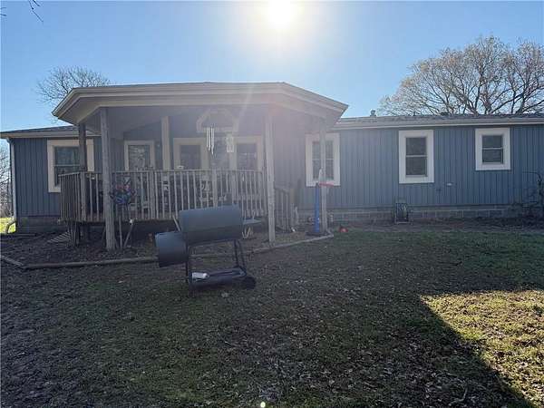 14.9 Acres of Land with Home for Sale in Stockton, Missouri