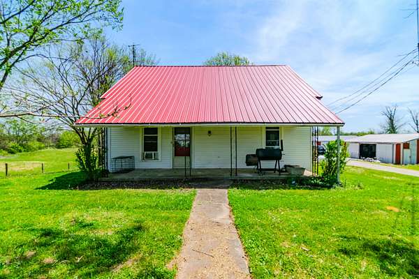 13.9 Acres of Land with Home for Sale in Lawrenceburg, Kentucky