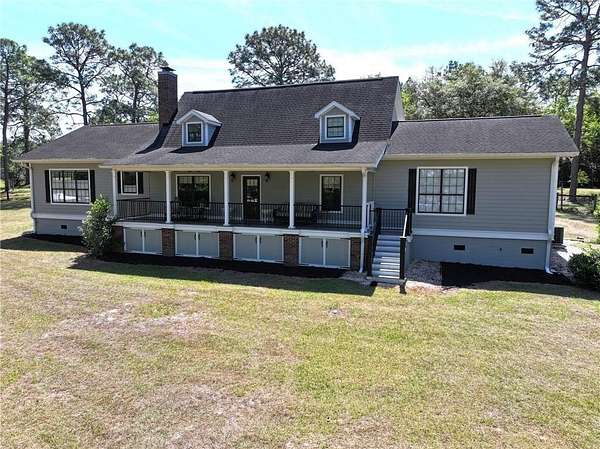 9.5 Acres of Land with Home for Sale in Jesup, Georgia