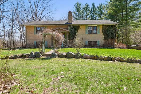 11 Acres of Land with Home for Sale in Chelsea, Michigan