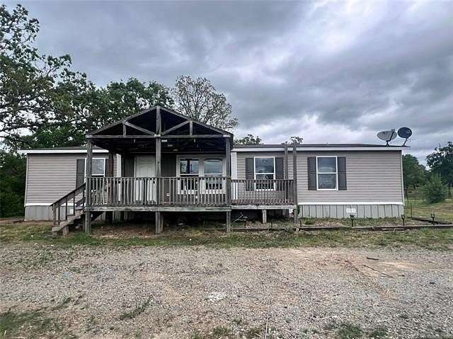 12.3 Acres of Land with Home for Sale in Porum, Oklahoma