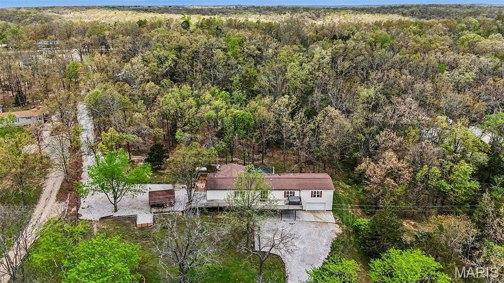 4.44 Acres of Land with Home for Sale in St. Marys Township, Missouri