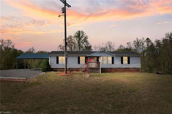 6.47 Acres of Land with Home for Sale in Westfield, North Carolina