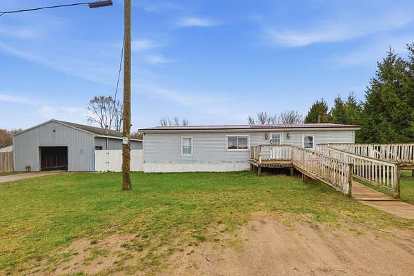 3.33 Acres of Land with Home for Sale in Shepherd, Michigan