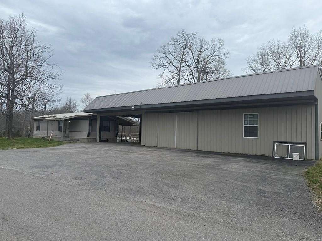 5.59 Acres of Land with Home for Sale in Burkesville, Kentucky