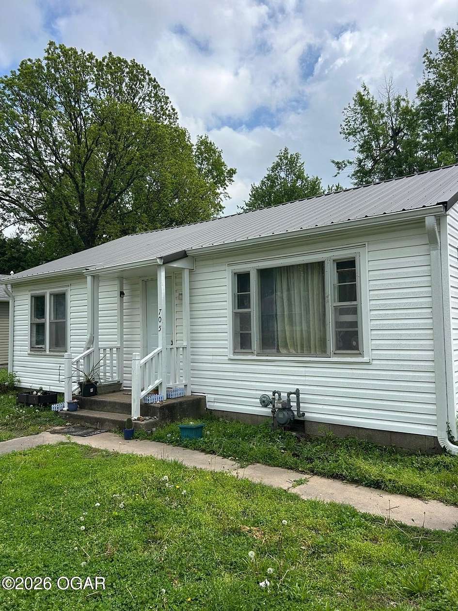 0.28 Acres of Land with Home for Sale in Lamar, Missouri