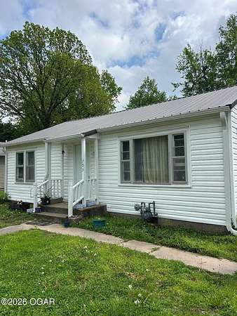 0.28 Acres of Land with Home for Sale in Lamar, Missouri