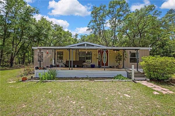 4.9 Acres of Land with Home for Sale in Brooksville, Florida