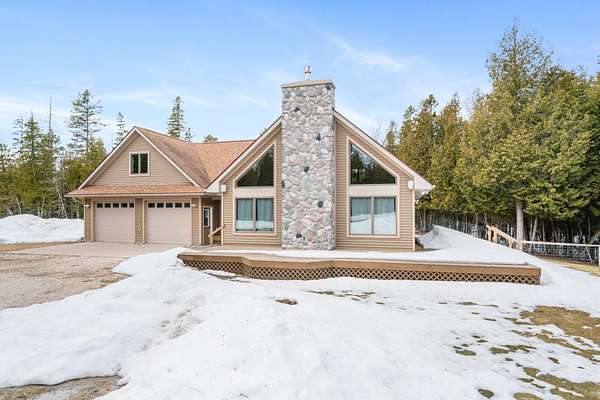 31.2 Acres of Recreational Land with Home for Sale in Hessel, Michigan