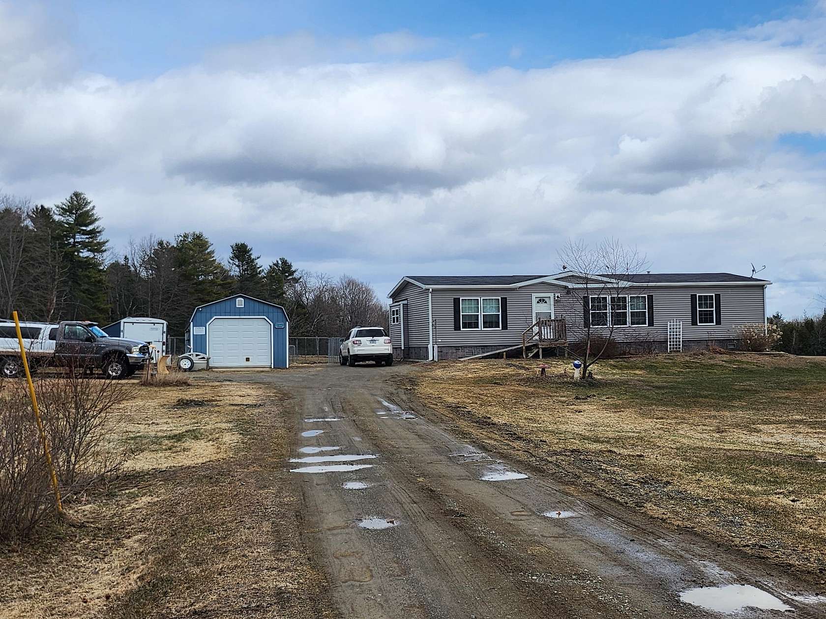 5.6 Acres of Land with Home for Sale in Corinna, Maine