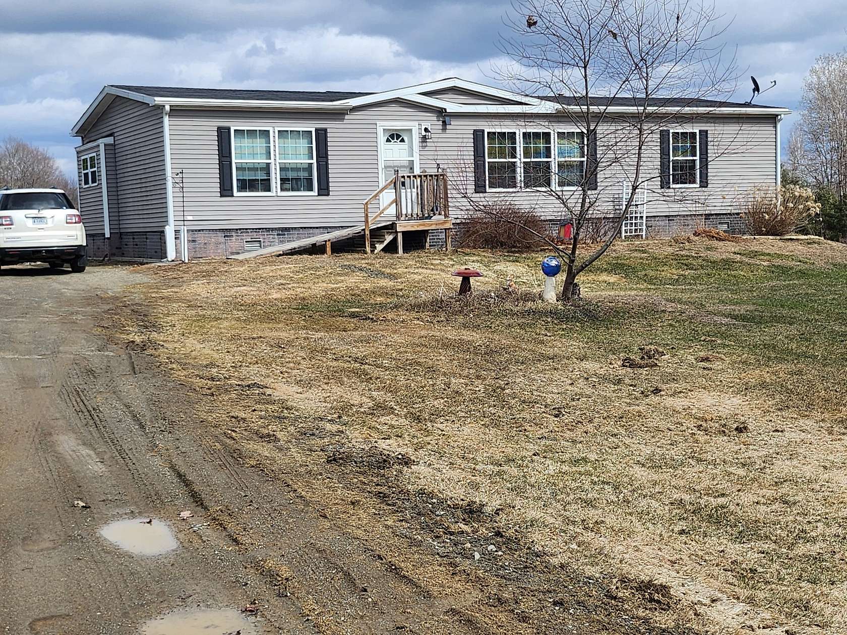 5.6 Acres of Land with Home for Sale in Corinna, Maine