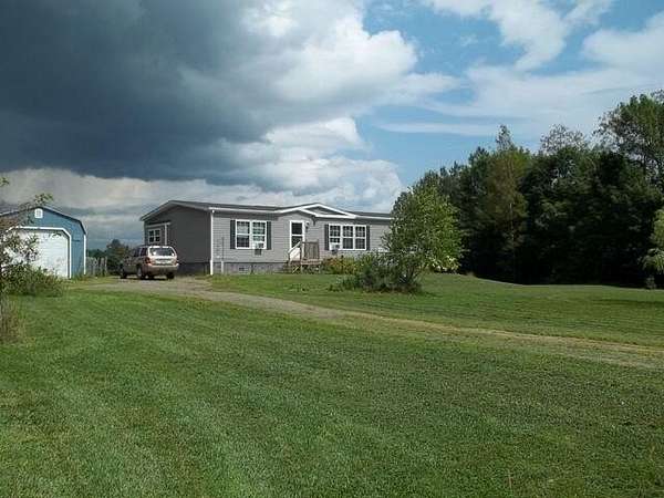 5.6 Acres of Land with Home for Sale in Corinna, Maine
